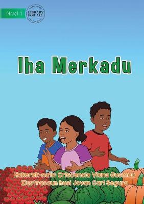 Book cover for At The Market - Iha Merkadu