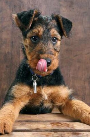 Cover of Airedale Terrier Puppy Dog Licks a Booger Journal