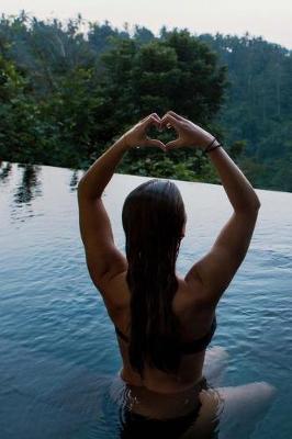 Book cover for Woman in an Infinity Pool in the Mountains Meditation Journal