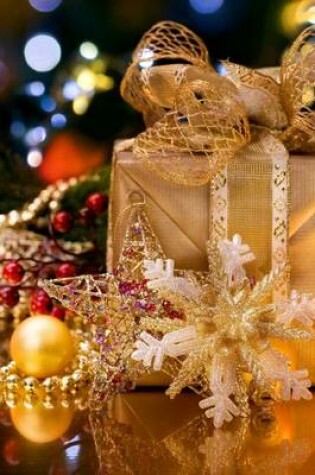 Cover of A Gold Paper Wrapped Present in Front of the Christmas Tree