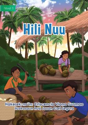 Book cover for Harvesting Coconuts - Hili Nuu