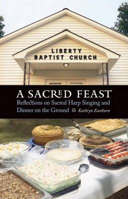 Cover of Sacred Feast, A: Reflections on Sacred Harp Singing and Dinner on the Ground. at Table.