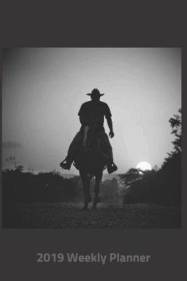 Book cover for Plan on It 2019 Weekly Calendar Planner - Cowboy on Horseback Trail Riding