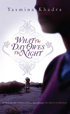 Book cover for What the Day Owes the Night