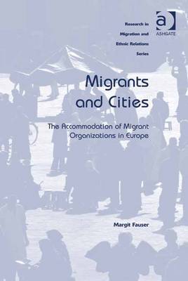 Book cover for Migrants and Cities