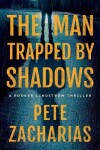 Book cover for The Man Trapped by Shadows