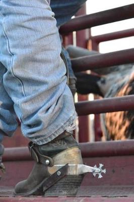 Book cover for A Cowboy Boots and Spurs at a Rodeo Journal