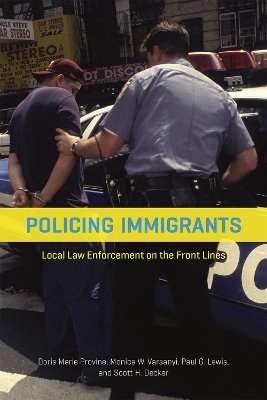 Cover of Policing Immigrants