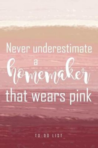 Cover of Never underestimate a homemaker that wears pink