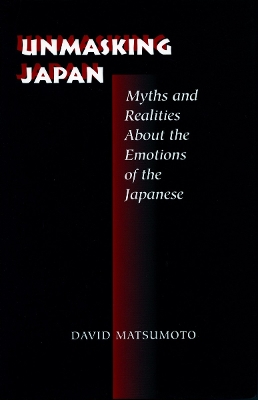 Book cover for Unmasking Japan