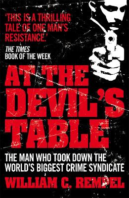 Book cover for At The Devil's Table