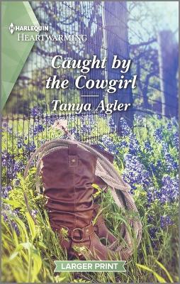 Cover of Caught by the Cowgirl