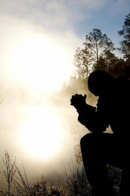 Book cover for A Man Praying at Dawn