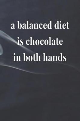 Book cover for A Balanced Diet Is Chocolate in both hands