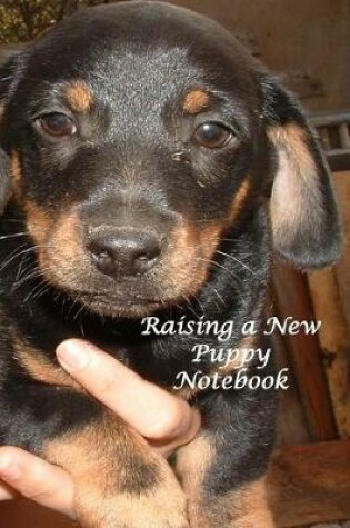 Cover of Raising a New Puppy Notebook